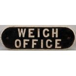 A cast iron doorplate 'Weigh Office': 12 x 37cm.