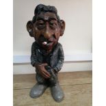 A late 20th century carved wood statue of Serge Gainsbourg: