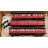 A group of six kit built O gauge LMS passenger coaches: including First & Guard,