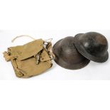 Two WWII Brodie pattern ARP helmets: together with a canvas gas mask bag and an ARP whistle by J