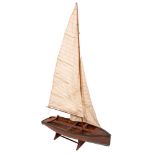 A scale model fishing boat: fully rigged over simulated plank deck and plank and pinned hull,