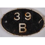 An Eastern region cast iron oval shed plate '39B': with paper label inscribed 'Sheffield Darnall