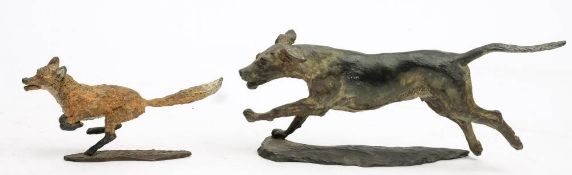 * Sally Rutherford (1940-) A cold painted bronze figure of a fox and another of a hound: both on