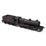 A kit built O gauge model of a BR Class 04/3 2-8-0 locomotive and tender No 63821: black with