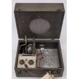 A Burndept Portable Model 241 'Attache' radio: in a grey simulated crocodile skin suitcase style