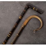 A late 19th/early 20th century sectional horn walking cane: with contrasting colours of horn in