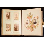 An Edwardian Musical Cabinet photograph album: playing 'Auld lang syne' with floral lithographed