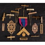 A collection of 9ct gold masonic jewel bars and pins etc: including two fobs, 55g.