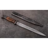 A WWII period German S84/98 bayonet: straight single edge fuller blade stamped '44fzg' and '2709C'