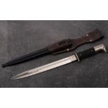 A Third Reich period K98 dress bayonet and scabbard by Anton Wingen Jr: black two piece chequered
