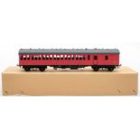 SBB (China) an O gauge model of a Suburban Brake coach in maroon: