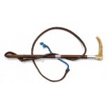 A silver mounted antler handled hunting whip by Swaine & Adney: the leather shaft with two silver