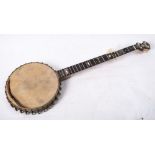 An early 20th century five string banjo by J Winder, London,