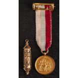 A 9ct gold Masonic fob together with a 9ct gold Masonic miniature jewel: (2)
