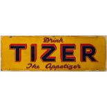 An enamel sign 'Drink Tizer. The Appetizer': blue and red text on a yellow ground, 30.5 x 90.5cm.