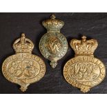 Two Victorian brass Royal cavalry horse harness crowns and a later Edwardian example:(3)