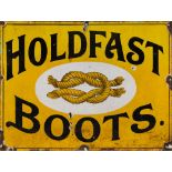 An enamel sign 'Holdfast Boots': black text on yellow ground around a oval cartouche with reef knot