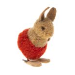 A mid 20th century Steiff puff ball rabbit, circa 1950s/60s: with felt ears and glass eye,
