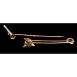 A 9ct gold fox mask pin brooch: and a stick-pin with horn motif.