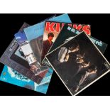 A group of eight vinyl albums including early issues of ROLLING STONES and The KINKS together with