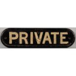A cast iron doorplate 'Private': 9x34.