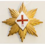 A gilt and enamel Masonic jewel: in the form of an eight pointed star with St.