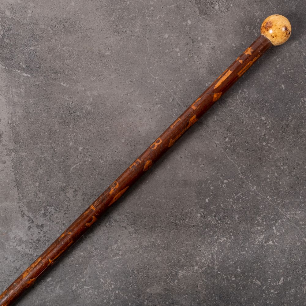 A 19th century American inlaid walking cane: the ivory ball pommel over shaft inlaid 'Liberty' and - Image 2 of 2