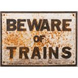 A cast iron railway sign 'Beware of Trains': black text on white ground, 35 x 49cm.