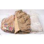 A late Victorian silk and embroidered shawl with floral needlework and lace trim: together with a