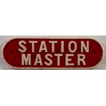 A cast iron doorplate 'Station Master': 12 x 37cm.