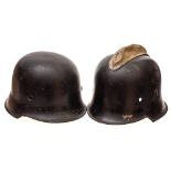 A WWII M1934 pattern German civil defence helmet: lacking insignia,