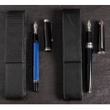 A Pelikan M400 Souveran fountain pen in blue: in a black leather case,