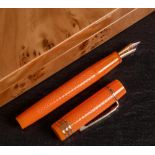 An Onoto Magna Classic Tangerine and Stirling silver limited edition fountain pen: No.