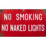 A red enamel warning sign 'No Smoking.