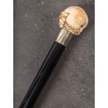 A late Victorian/Edwardian erotic walking cane: the ivory pommel carved in the form of a female