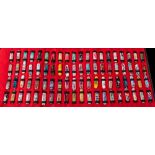 A collector's case of eighty special edition Victorinox Classic Swiss Army penknives: including