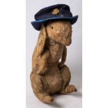 A large mid 20th century blonde plush rabbit: (poor condition) together with a Devon Ambulance