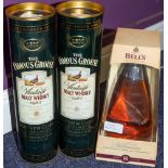 Two bottles of Famous Grouse 1987 Vintage Malt Whisky and a bottle of Bell's Extra Special