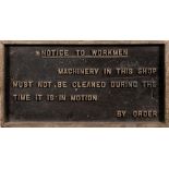 A wooden workshop sign 'Notice To Workmen.