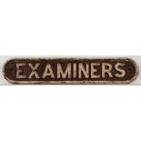A cast iron doorplate 'Examiners': 9 x 48cm.
