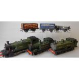 An OO/HO gauge scratchbuilt 2-6-2 tank locomotive: No 5552 in GWR green livery,