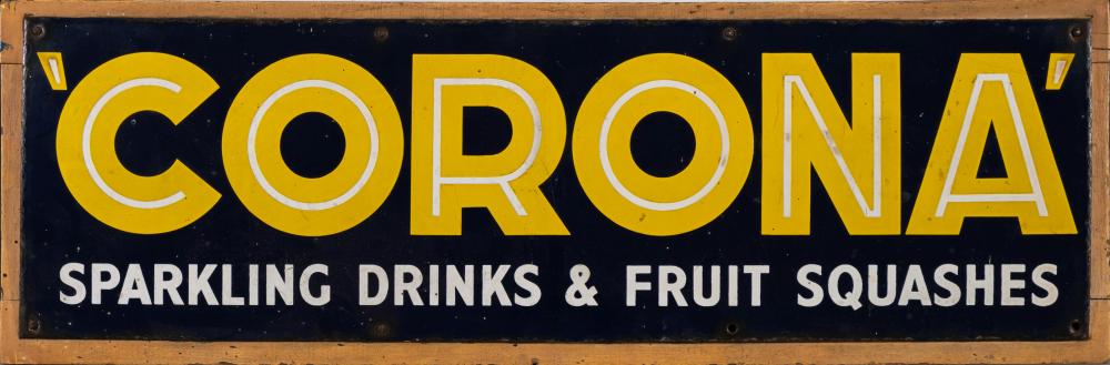 An enamel sign 'Corona Sparkling Drinks & Fruit Squashes': yellow and white text on a dark blue