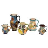 *Paul Jackson (Contemporary) five terracotta jugs: of various forms each with a strap handle and