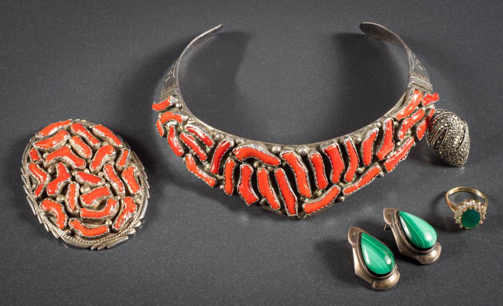 A North American silver and coral necklace with matching coral brooch,