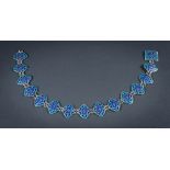 A blue champleve enamelled silver belt: of oval links, possibly Persian,