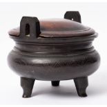 A Chinese bronze and silver wire-inlaid tripod censer: of globular form with waisted neck,