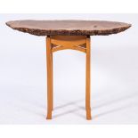 A contemporary side table formed from a section of burr-figured oak:,