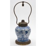 A Chinese blue and white baluster jar [as a lamp]: painted overall with butterflies and birds