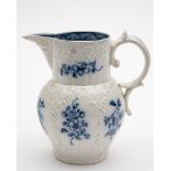 A Badderley Littler cabbage leaf jug: with scroll handle, the rim moulded with fruiting vine,