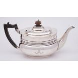 A George V silver teapot, maker Edward Barnard & Sons, London, 1911: bearing Prideaux family crest,